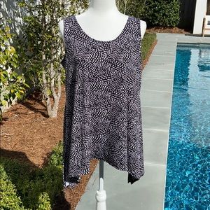 Alfani sleeveless top with scoop neckline.